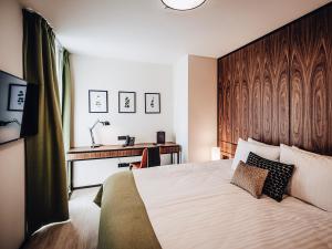 Postel nebo postele na pokoji v ubytování Apartamenty Sowa Bydgoszcz