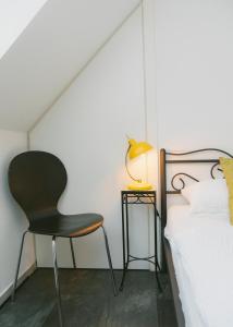 Una cama o camas en una habitación de Gästehaus Vigliarolo