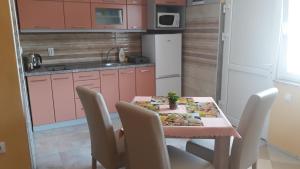 Kuchyň nebo kuchyňský kout v ubytování Andi Apartman