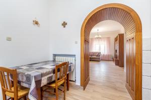 Łóżko lub łóżka w pokoju w obiekcie Apartments Krc