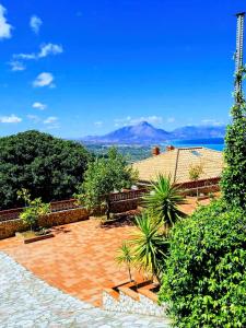 a patio with a view of the mountains at Villa Verde in Cefalù