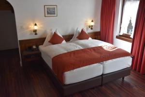Postel nebo postele na pokoji v ubytování Hotel Astoria