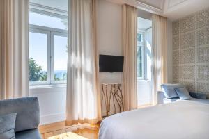 Postel nebo postele na pokoji v ubytování Santiago de Alfama - Boutique Hotel
