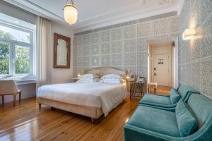 Postel nebo postele na pokoji v ubytování Santiago de Alfama - Boutique Hotel