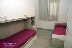 Posteľ alebo postele v izbe v ubytovaní Casa Matilde