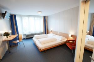 Voodi või voodid majutusasutuse Hotel Kreuz toas