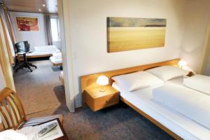 Voodi või voodid majutusasutuse Hotel Kreuz toas