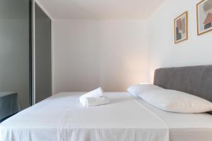 Posteľ alebo postele v izbe v ubytovaní Golden Luxury Apartment