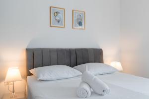 Posteľ alebo postele v izbe v ubytovaní Golden Luxury Apartment