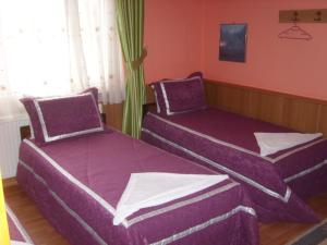 Кровать или кровати в номере Aspawa Hotel