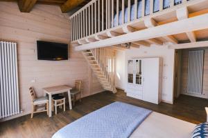 Televízia a/alebo spoločenská miestnosť v ubytovaní b&b al fienile
