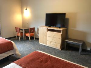 TV a/nebo společenská místnost v ubytování Timberlake Hotel