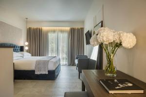 Posteľ alebo postele v izbe v ubytovaní Thalassa Boutique Hotel - Adults Only