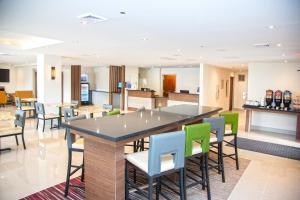 a large dining room with a table and chairs at Extended Stay America Suites Springfield in Springfield