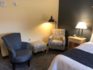 Postel nebo postele na pokoji v ubytování Timberlake Hotel
