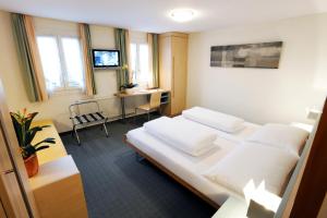 Voodi või voodid majutusasutuse Hotel Kreuz toas