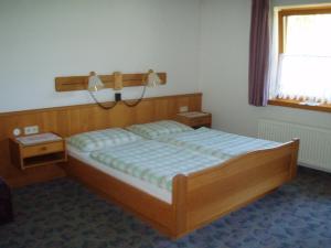Posteľ alebo postele v izbe v ubytovaní Appartement Pension Grasser