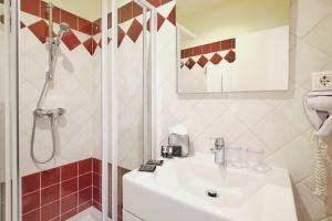 a bathroom with a sink and a shower at Sintra Bliss A Part in Sintra