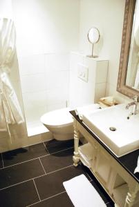 Ein Badezimmer in der Unterkunft Suite " Mon Rêve "