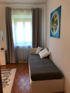 Postel nebo postele na pokoji v ubytování B&B dal Giotu