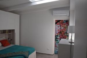Ένα ή περισσότερα κρεβάτια σε δωμάτιο στο La Quintecita villa con piscina privata - vicino Catania e Etna +30 φωτογραφίες