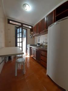 A cozinha ou cozinha compacta de Berty-Ocas Apart Hotel