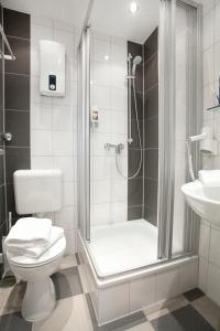 Ett badrum på Hotel Design Apart