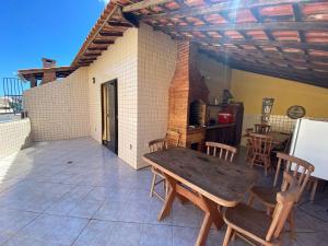Balkoni atau teres di Cobertura Duplex na Prainha com Churrasqueira