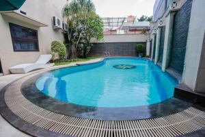 Bazén v ubytování Jambuluwuk Residence Menteng nebo v jeho okolí