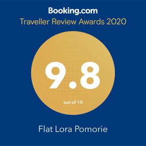 a yellow circle with the number eight and the text travelling review awards at Flat Lora Pomorie in Pomorie