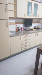 Kuchyňa alebo kuchynka v ubytovaní Apartamentos Quien Anda Ahí Ribadeo