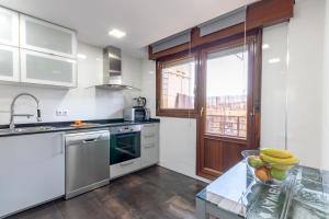 Kuchyň nebo kuchyňský kout v ubytování Precioso apartamento cerca de Bilbao Exhibition Center -BEC-, Bilbao y playas