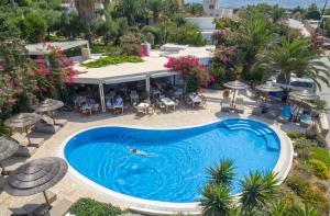 an overhead view of a pool at a resort at Kavos Hotel Naxos in Agios Prokopios