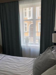 Voodi või voodid majutusasutuse Hamnhotellet toas
