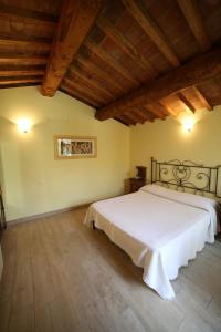 Postel nebo postele na pokoji v ubytování Podere Serena + 37 fotografií