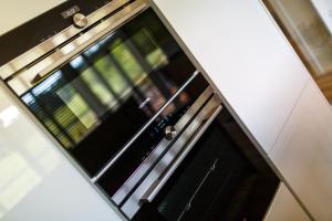 Kuchyň nebo kuchyňský kout v ubytování Apartmán na golfu