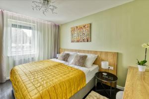 Posteľ alebo postele v izbe v ubytovaní Club Luxury Apartman + 37 fotografií
