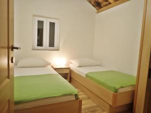 Posteľ alebo postele v izbe v ubytovaní Mareta - Apartment in a stone house
