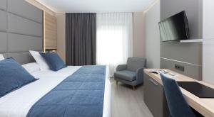 
Cama o camas de una habitación en Hotel Liabeny
