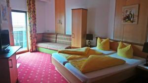 Letto o letti in una camera di Hotel-Garni Pramstraller