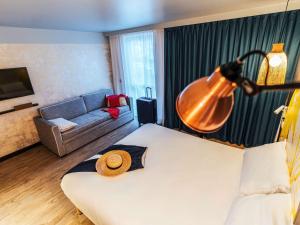 Postel nebo postele na pokoji v ubytování ibis Styles Le Treport Mers Les Bains