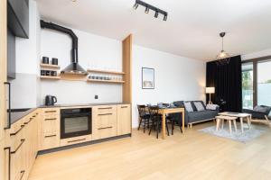Kuchyň nebo kuchyňský kout v ubytování Apartamenty Garnizon Doskonała Lokalizacja Gdańsk by Noclegi Renters