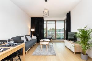 Posezení v ubytování Apartamenty Garnizon Doskonała Lokalizacja Gdańsk by Noclegi Renters