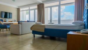 TV a/nebo společenská místnost v ubytování Hotel & Spa Tino Sveti Stefan