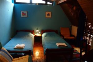 Postel nebo postele na pokoji v ubytování Guest Accommodation Etno Konak Tašana