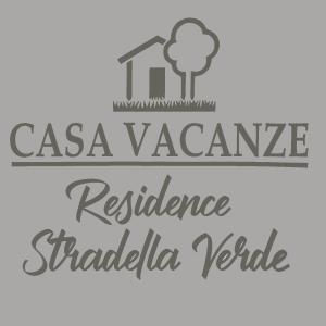 ein Etikett mit den Worten "Versicherung und Haus" in der Unterkunft Residence Stradella Verde in Staranzano