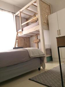 Postel nebo postele na pokoji v ubytování MOY Guesthouse & Backpackers