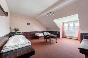 Posteľ alebo postele v izbe v ubytovaní Hotel Floret