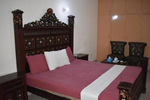 Кровать или кровати в номере Hotel Basaira