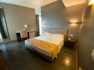 Postel nebo postele na pokoji v ubytování Hotel Joseph